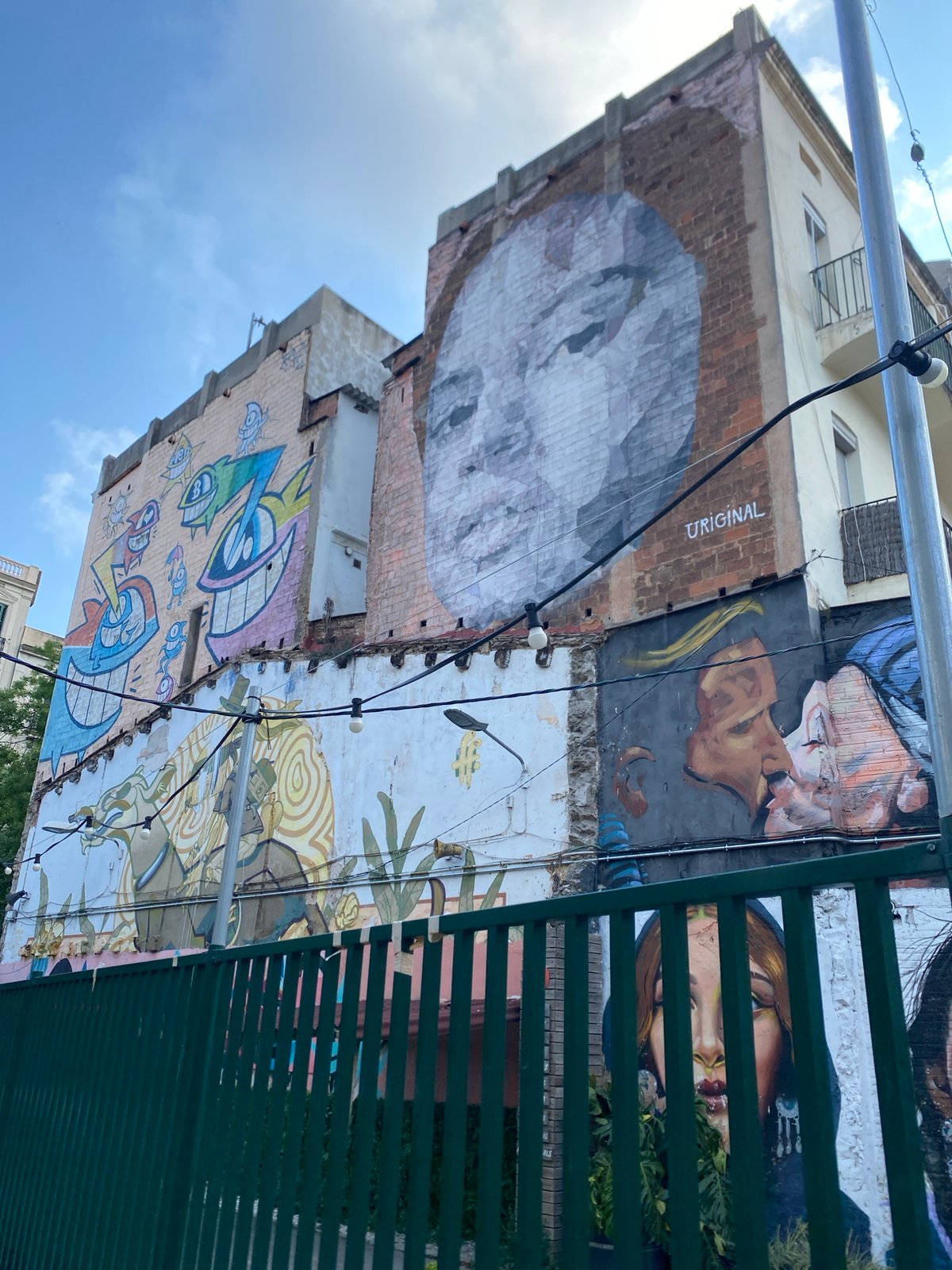 Vibrant street art murals documented across Barcelona neighborhoods