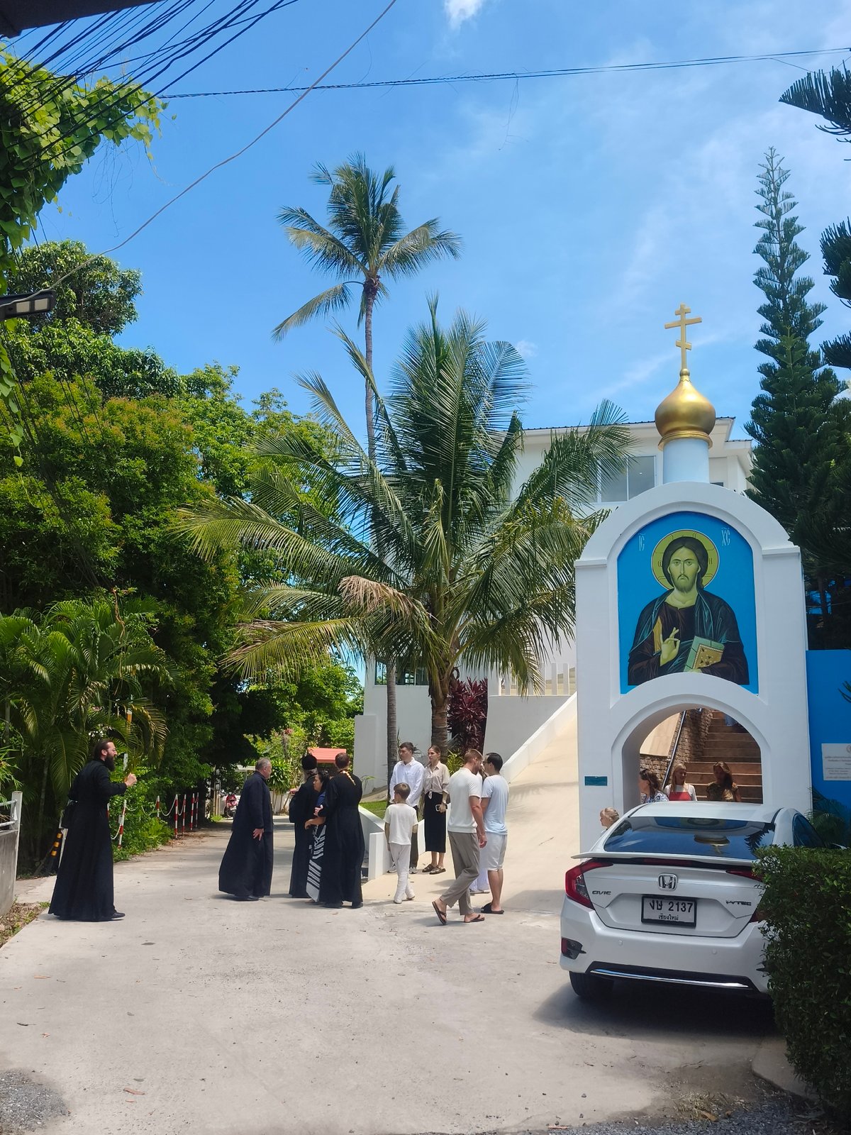 Morning gathering outside an Orthodox church on Ko Samui