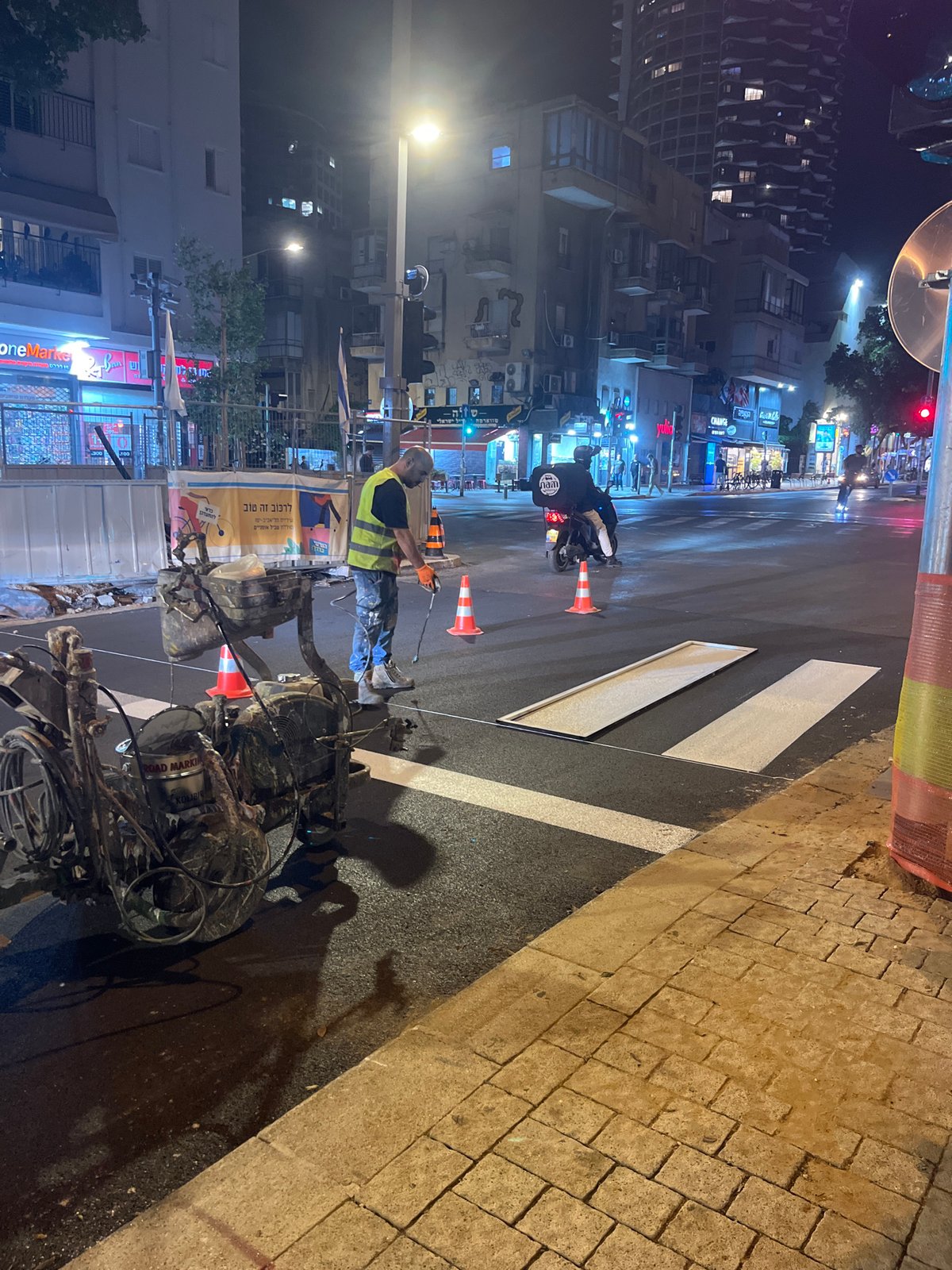 Road-marking equipment spotted on Tel Aviv street at night