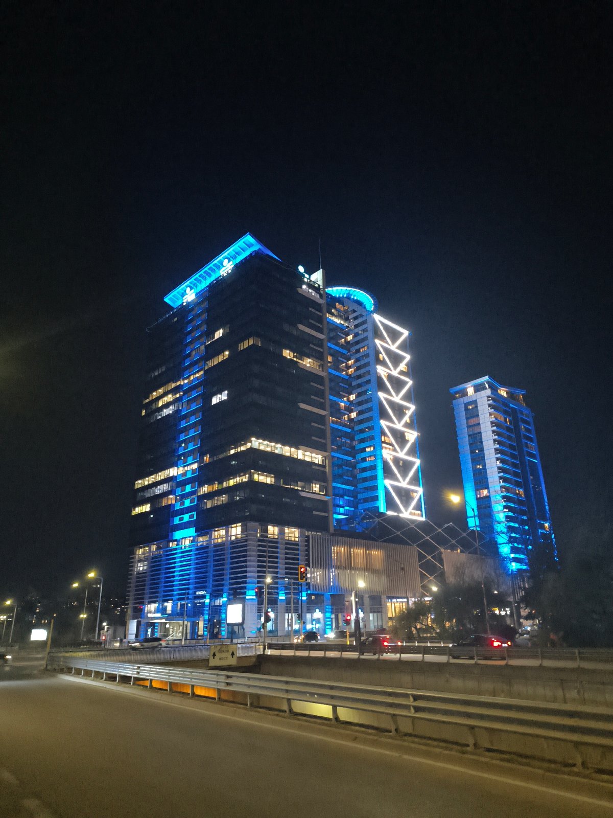 Capital Fort buildings illuminated blue and white in Sofia