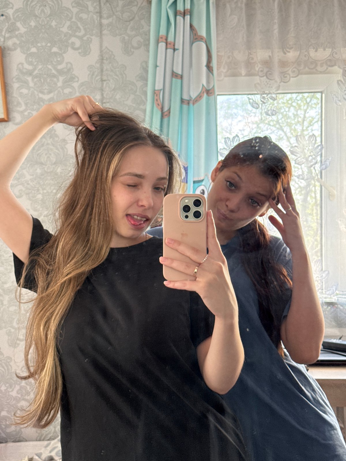 Family photos and cat video captured in Кемуль, Russia