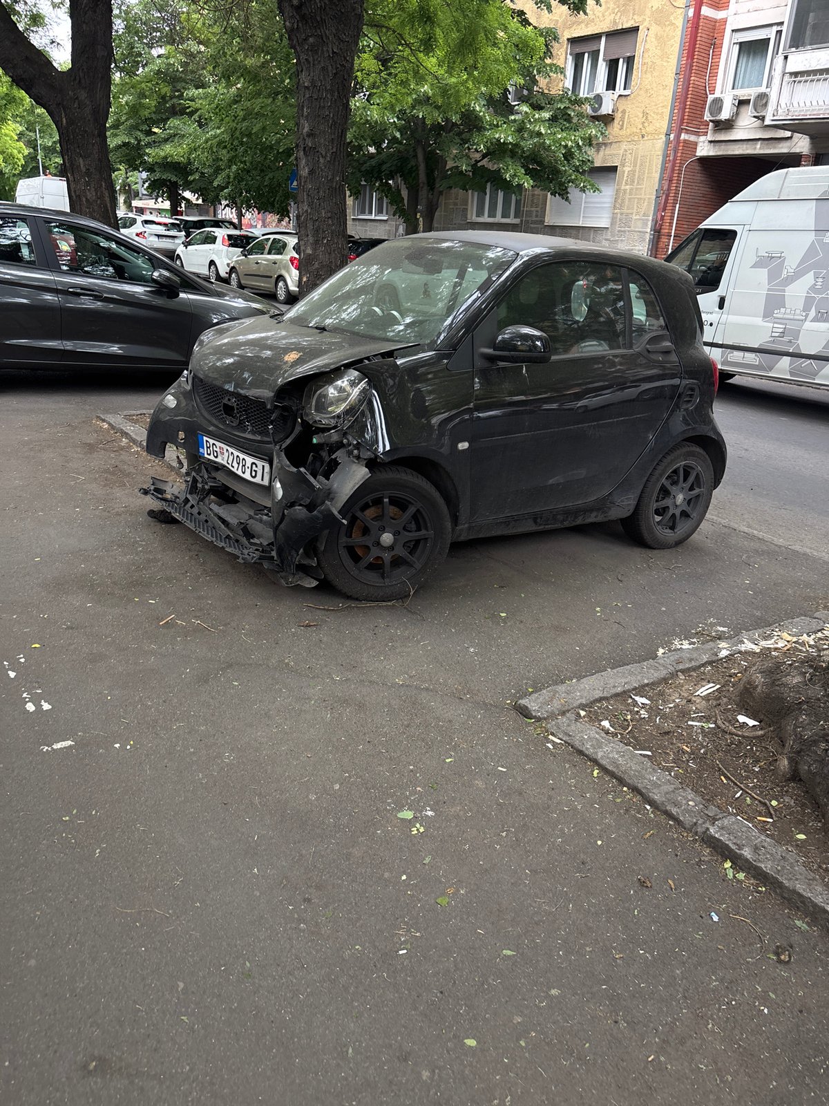 Damaged Smart car spotted on Zemun street following apparent collision