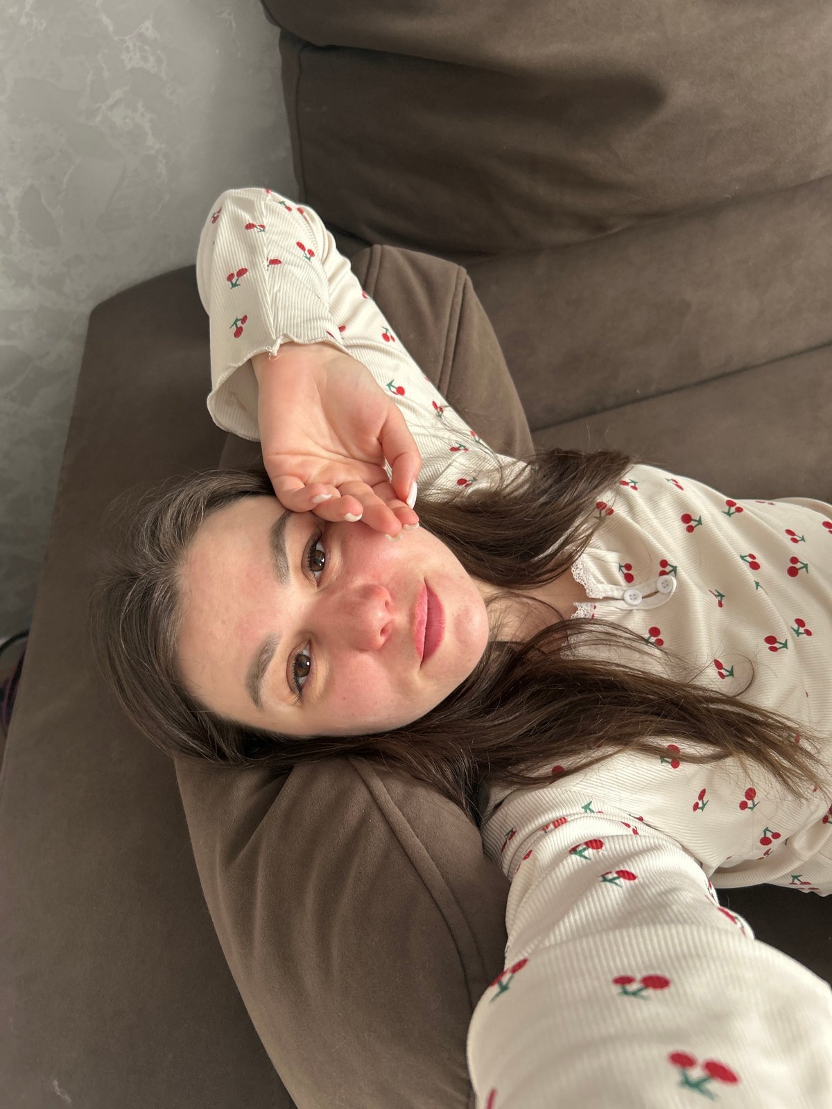 Morning family moment captured on sofa in Chaikovsky
