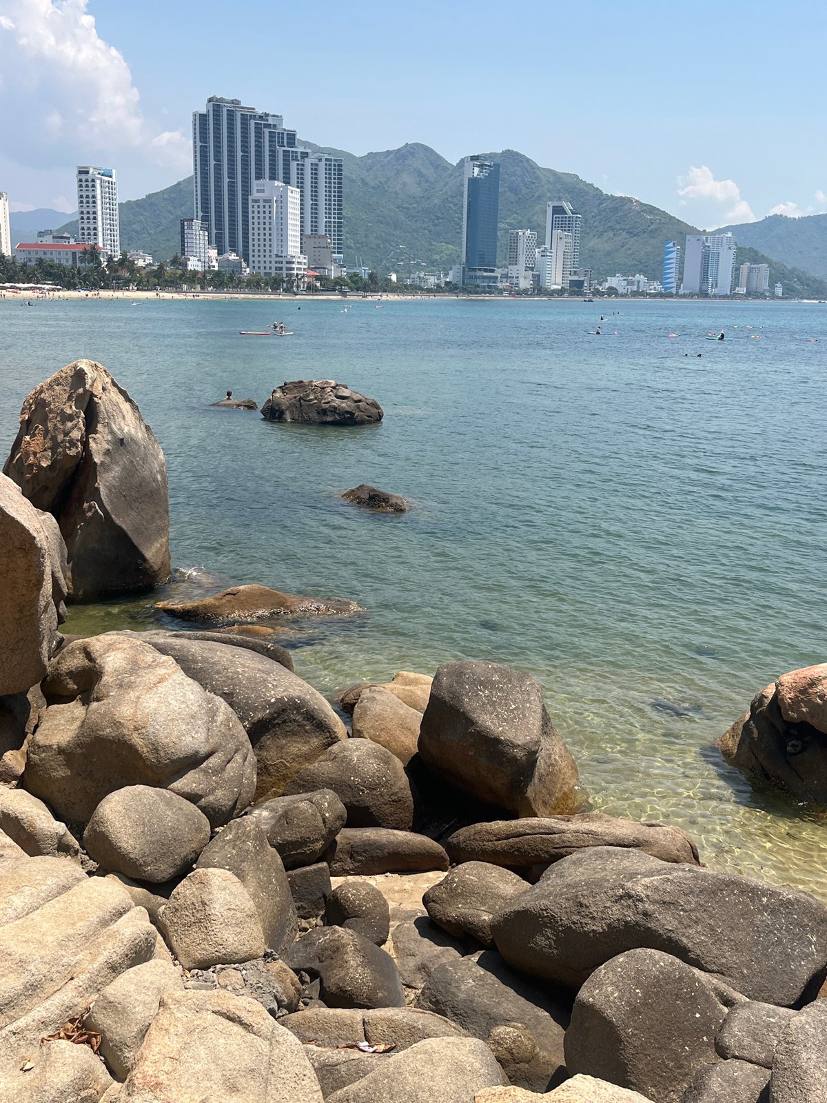 Nha Trang's rocky northern bay on a clear summer morning