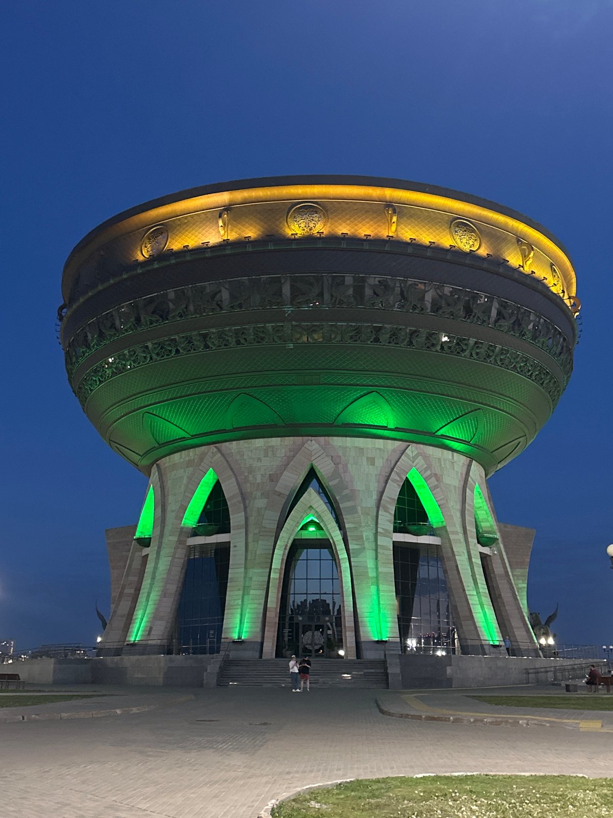 Evening family visit to Kazan landmarks captured at dusk