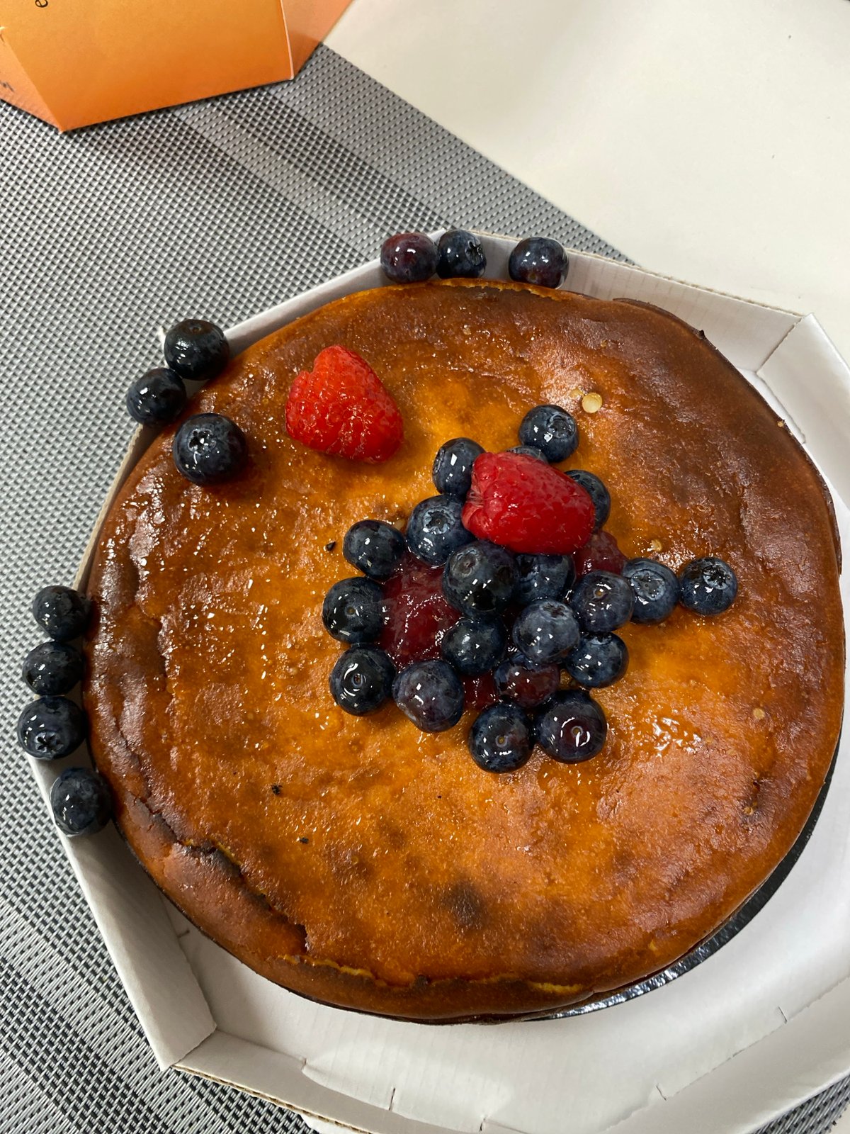 Berry cheesecake served with tea in Saint Petersburg