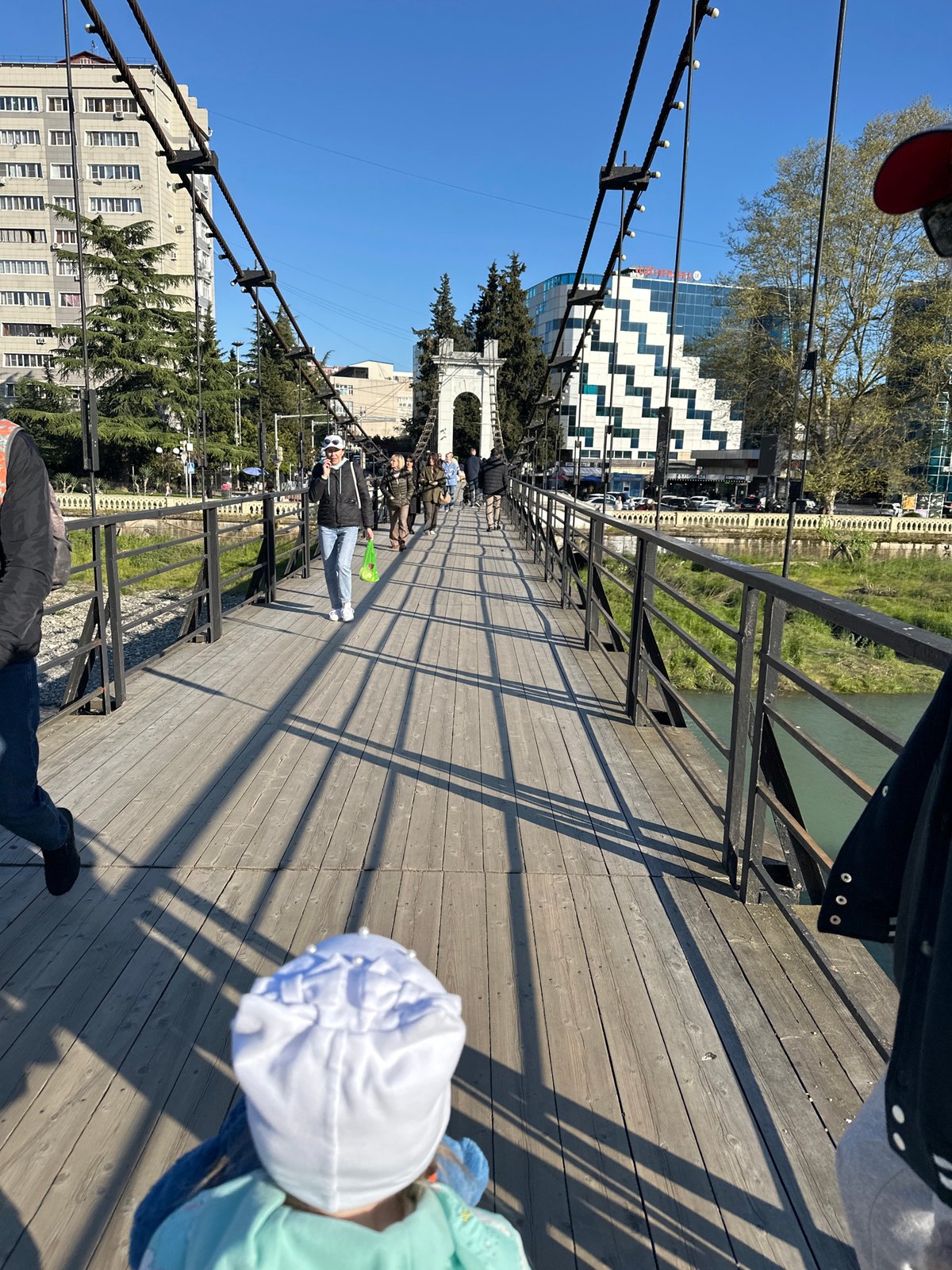 Family enjoys sunny afternoon outing in Sochi parks and playgrounds