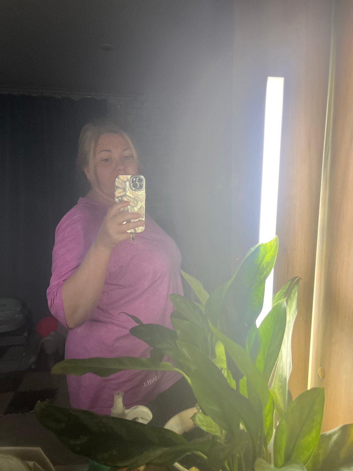 Women take mirror selfies in Vesyoloye, Russia