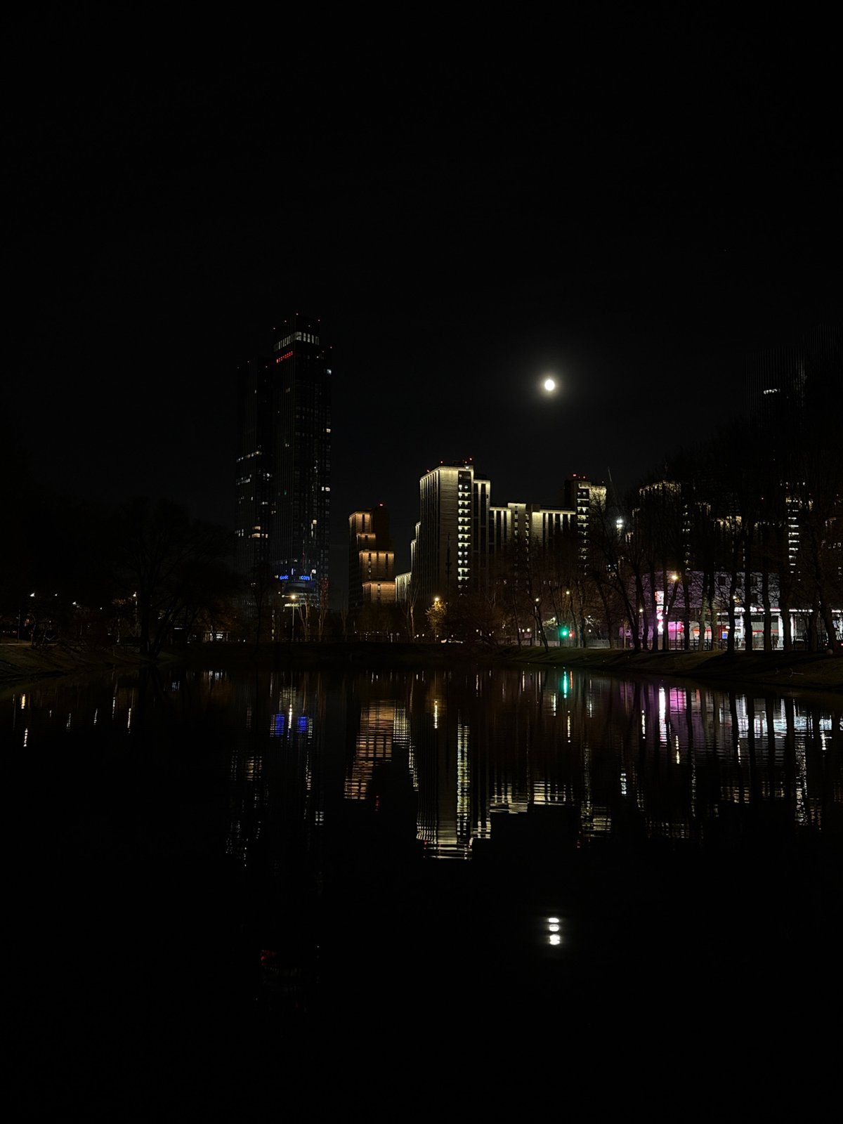 Moonlit building reflection captured in Khimki waters
