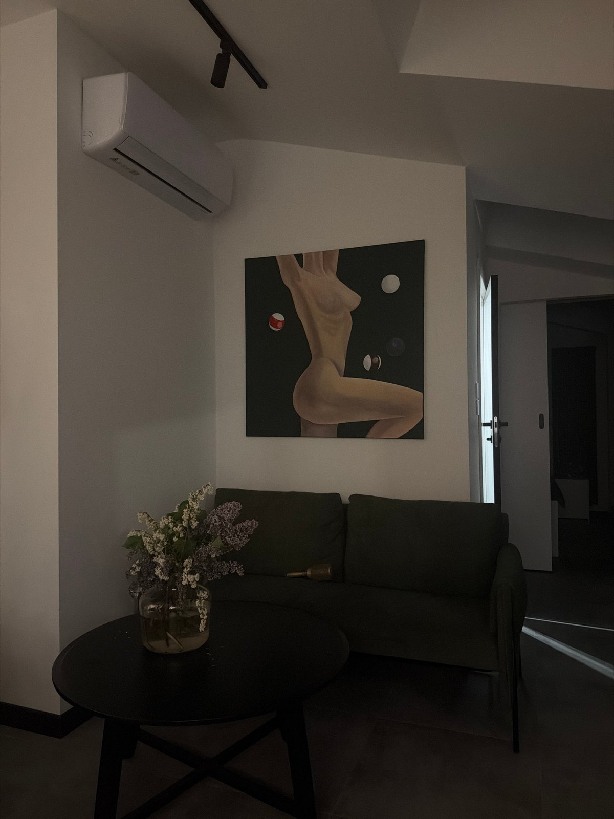 Woman documented in indoor setting during evening hours