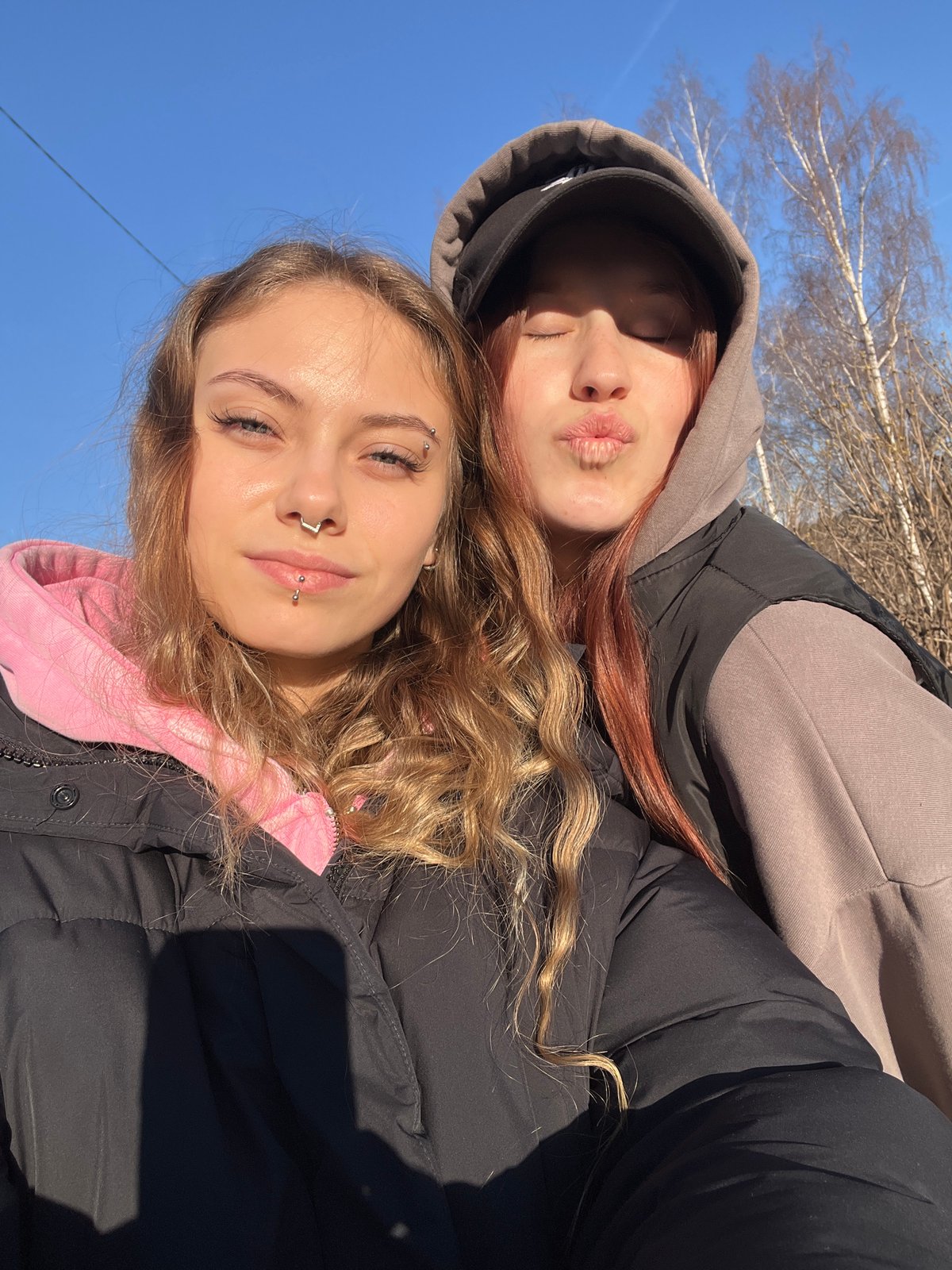 Young women take selfies in Фоки, Russia