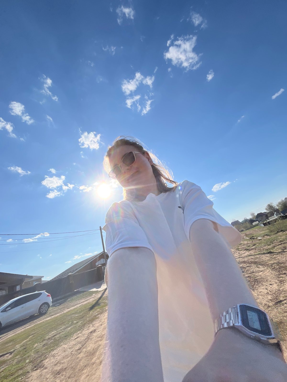 Woman photographed with infant during rural outing in Chaikovsky