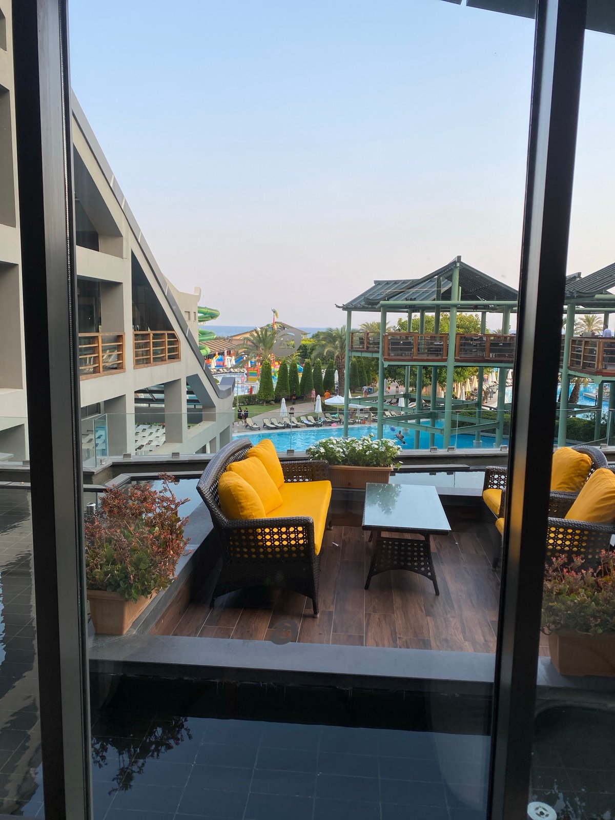 Afternoon at a resort in Aksu, poolside and indoors