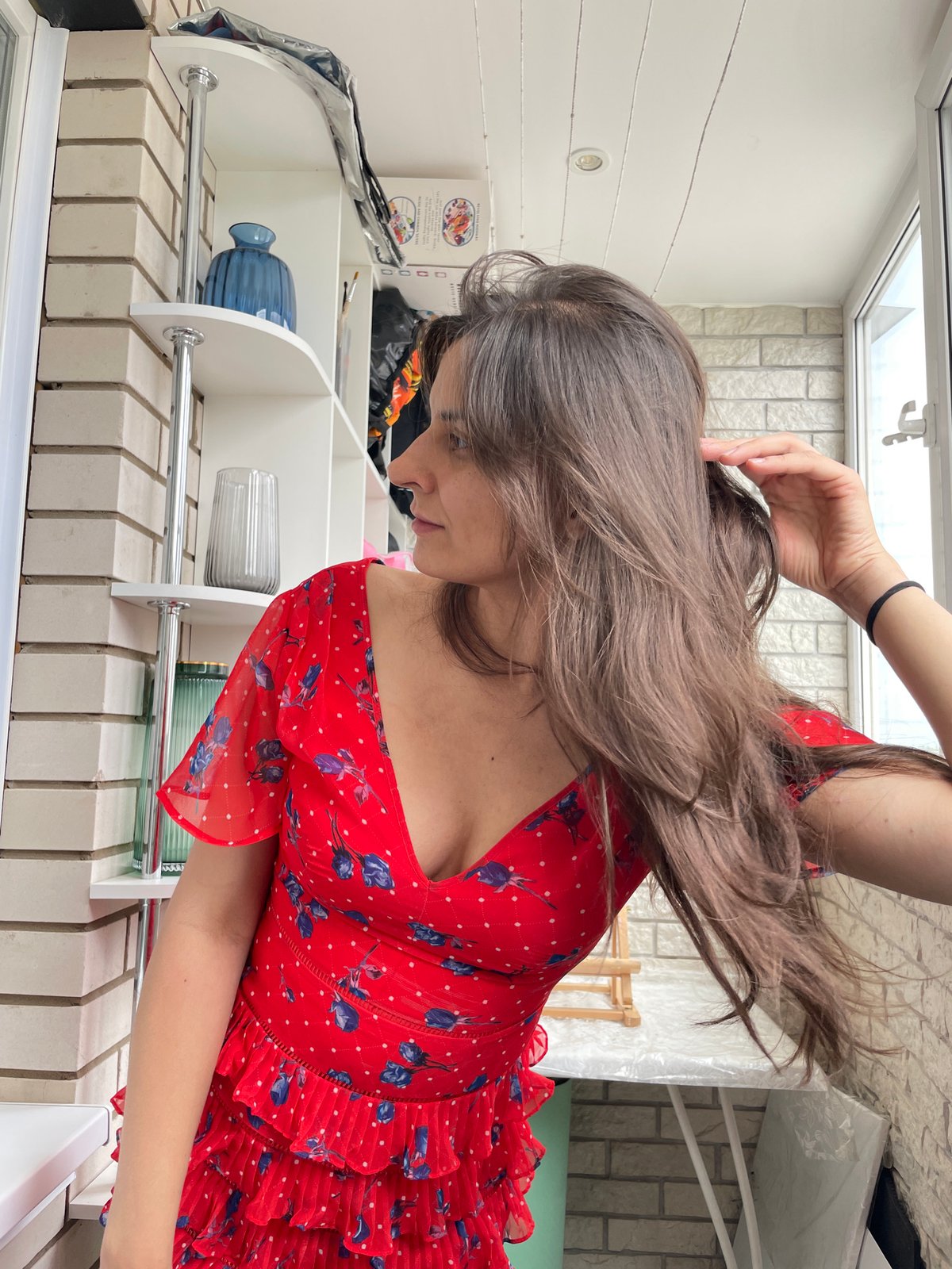 Red floral dress shoot across an Izhevsk apartment setting