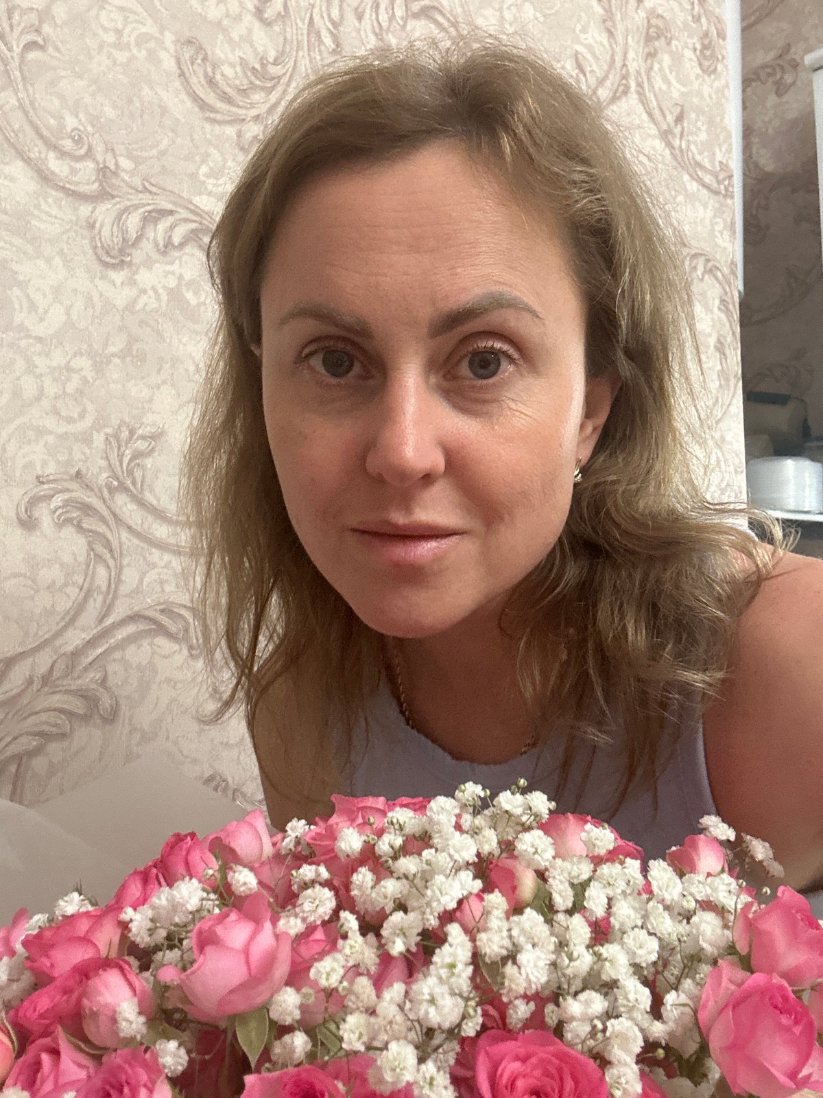 Kitchen activities with pink roses and food prep in Russia