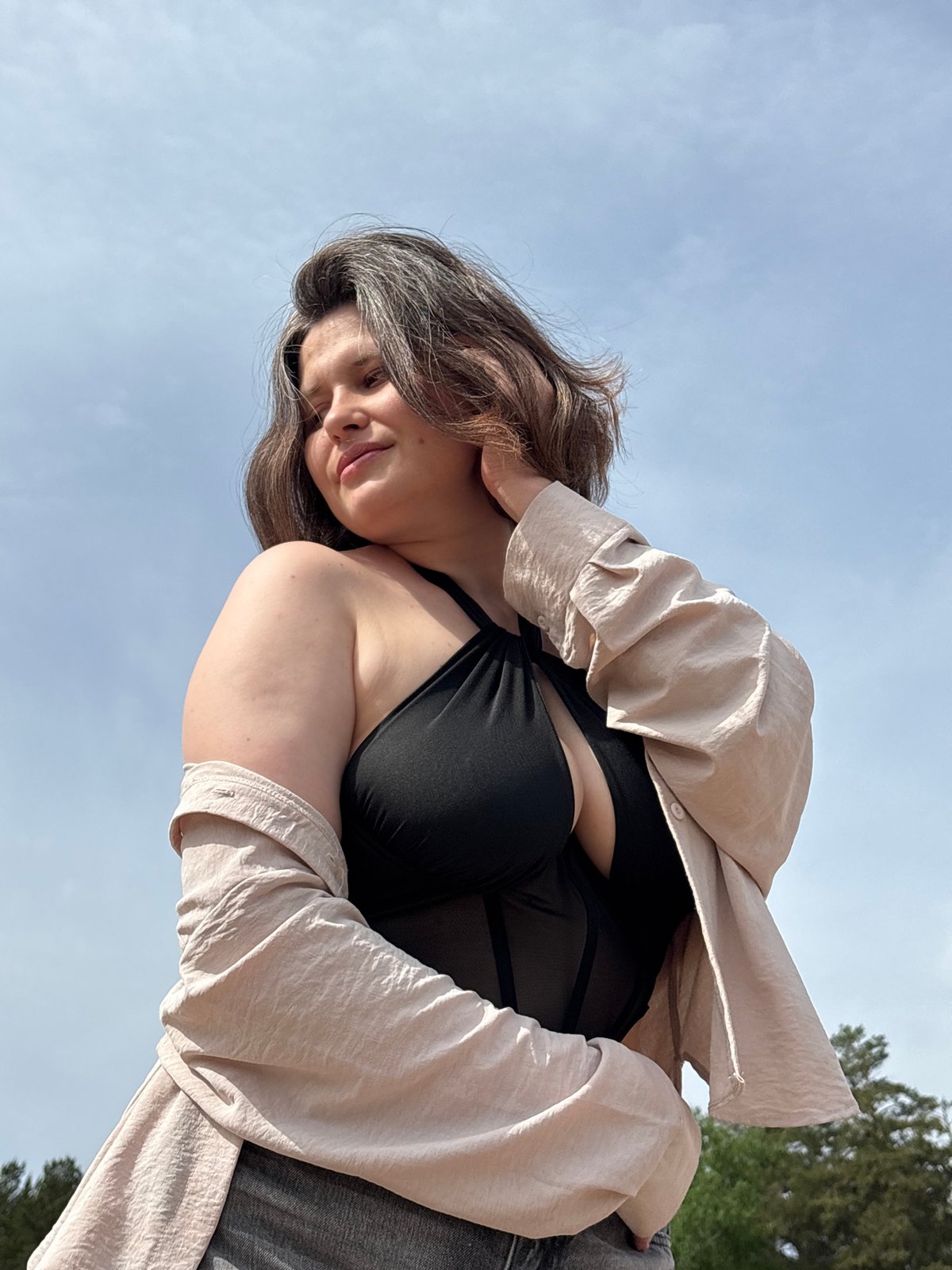 Woman photographed outdoors in Chaikovsky, Russia morning scene