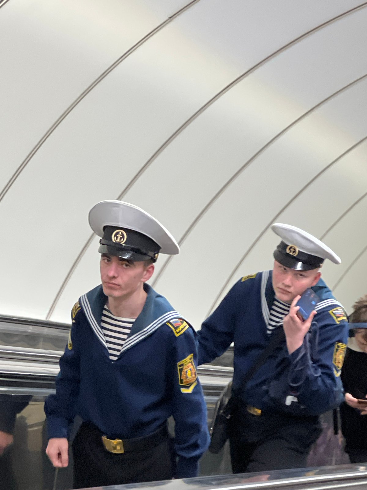 Russian naval personnel spotted on Saint Petersburg escalator