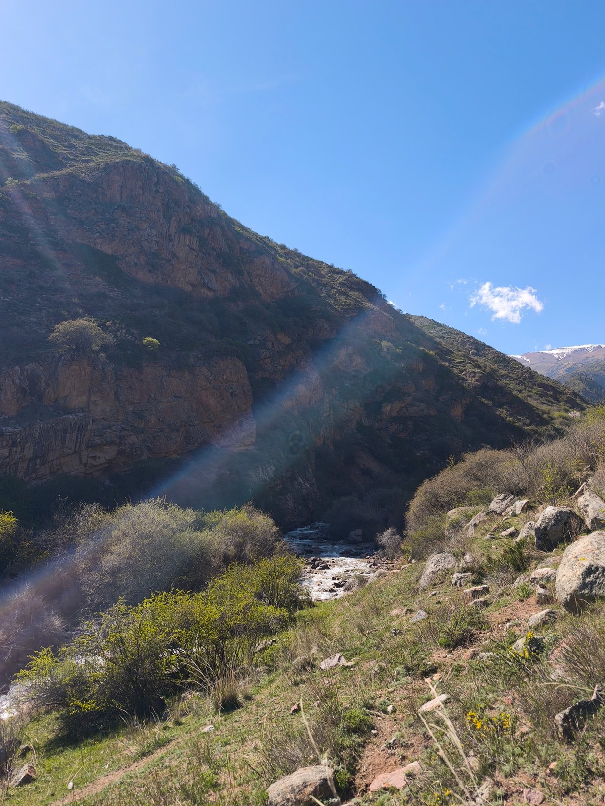 Hiker explores mountain trails near Cholpon Ata, Kyrgyzstan