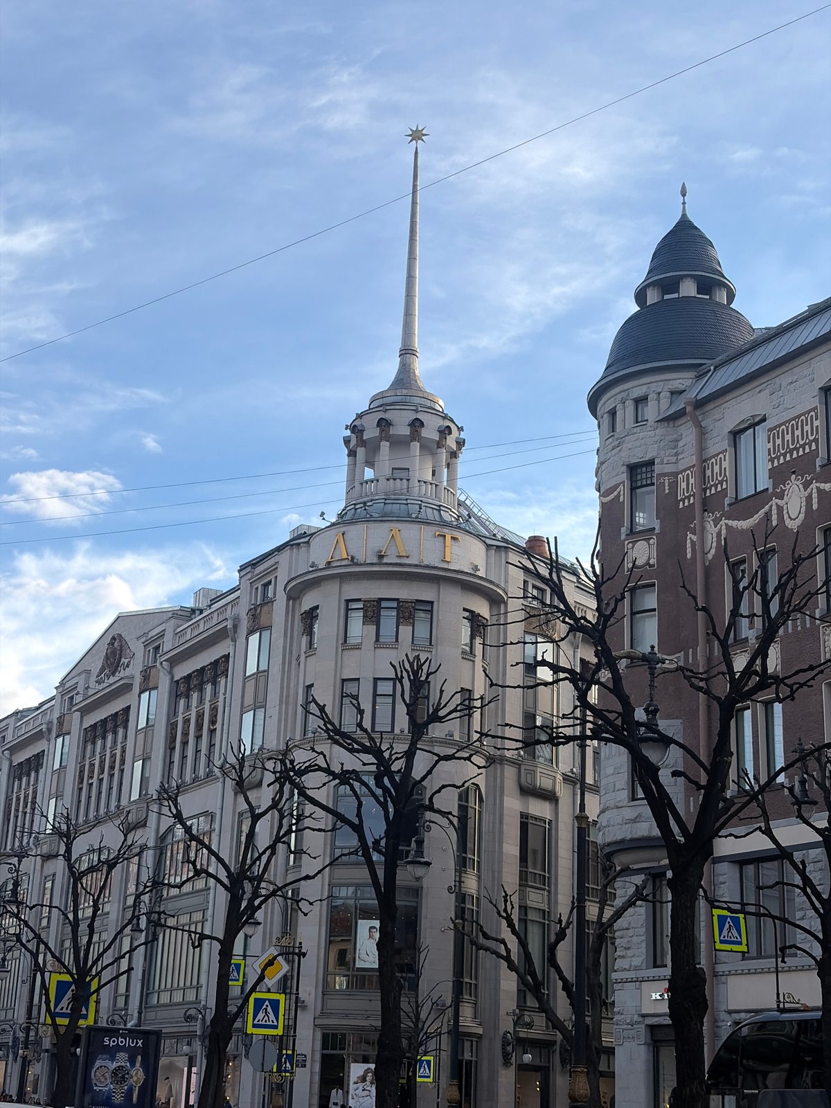 Tourist documents Saint Petersburg landmarks and selfies during afternoon walkabout