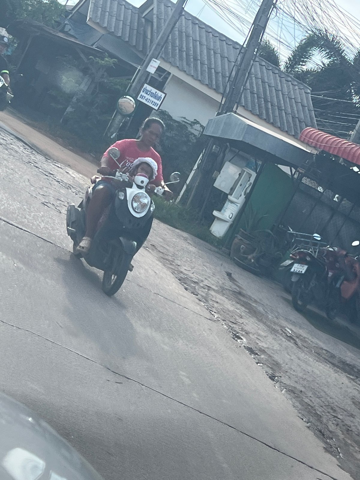 Ordinary morning street life captured in Thai village
