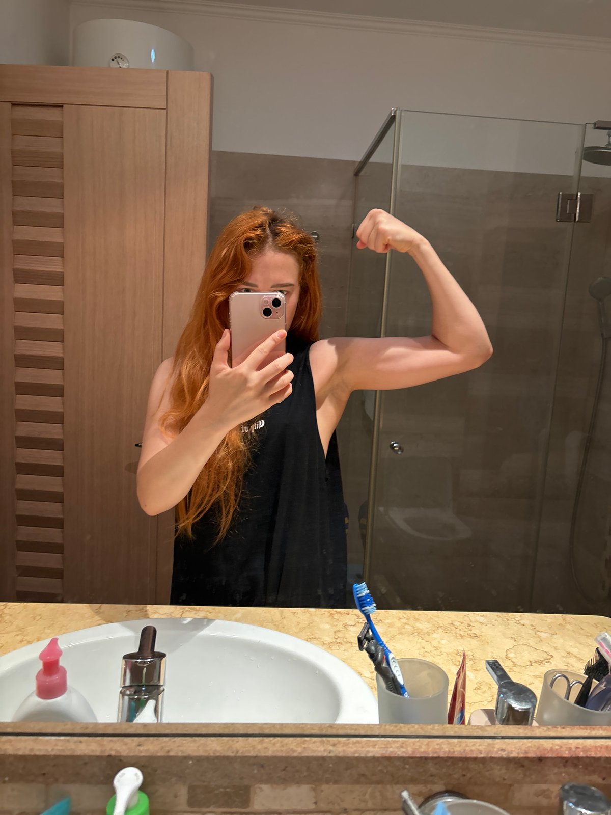 Woman documents morning routine with selfies in Budva, Montenegro