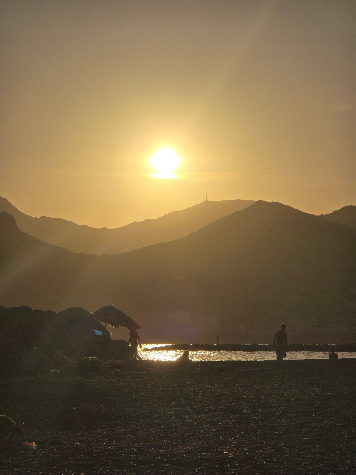 Sunset beach evening documented in Salerno, Italy