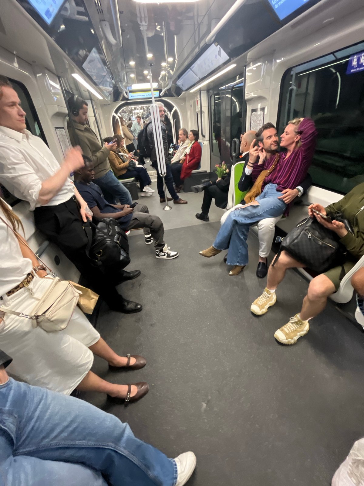 Crowded subway car observed in Paris during evening hours