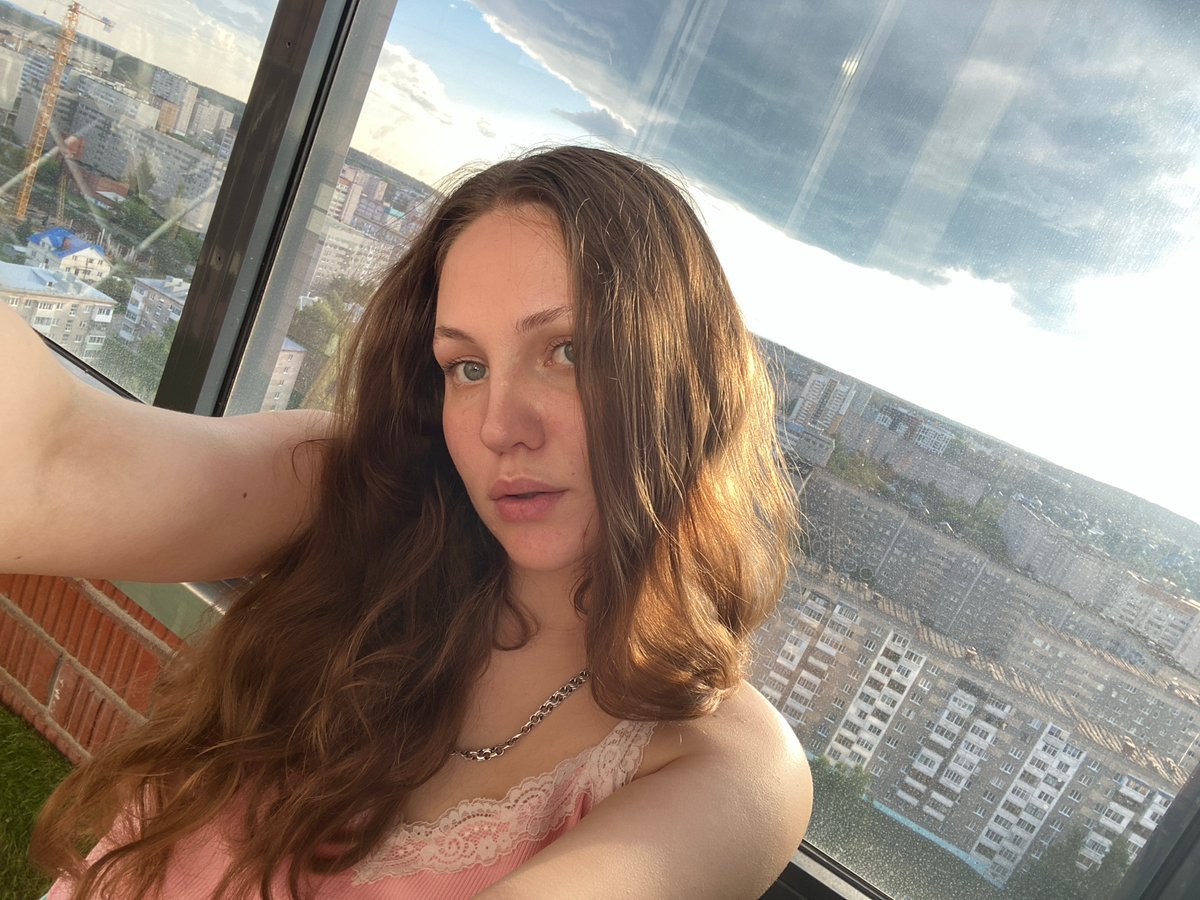 Casual high-rise selfie session overlooking Izhevsk