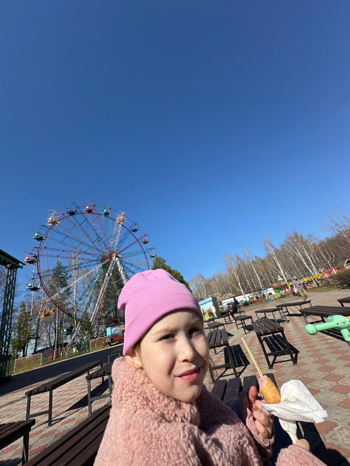 Family enjoys spring day at Chaikovsky amusement park and waterfront