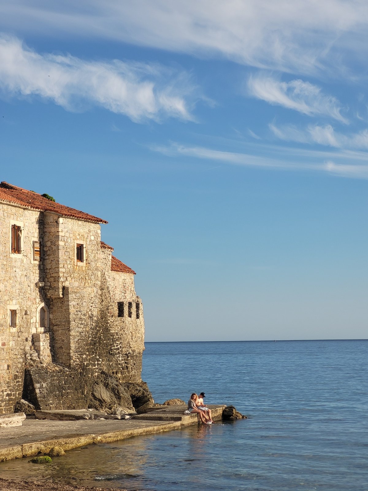 Clear skies and historic architecture captured in Budva