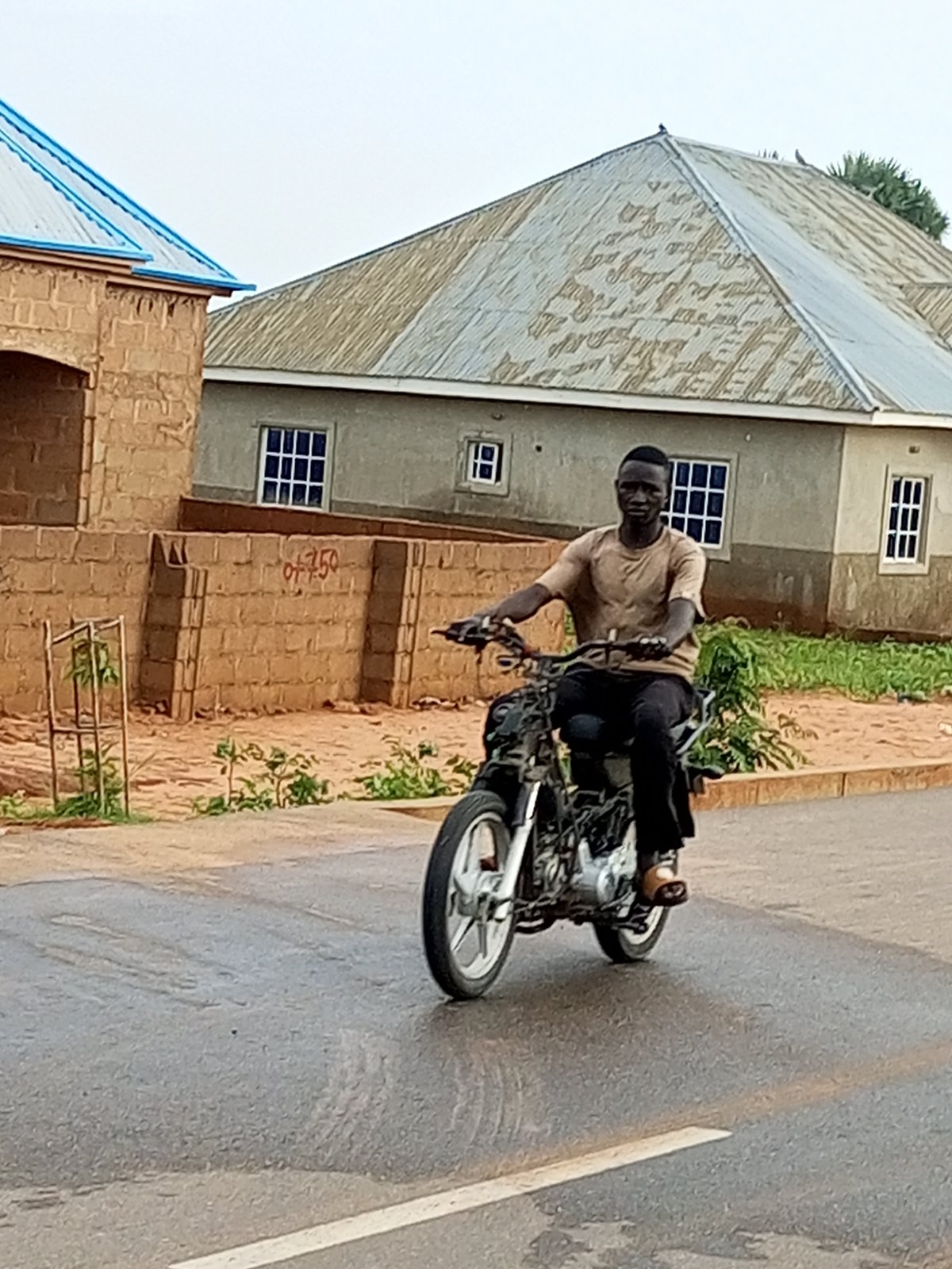Motorcycle ride on a rain-slicked road