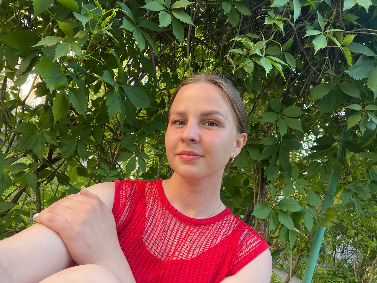Woman in red mesh top photographed around Izhevsk, Russia