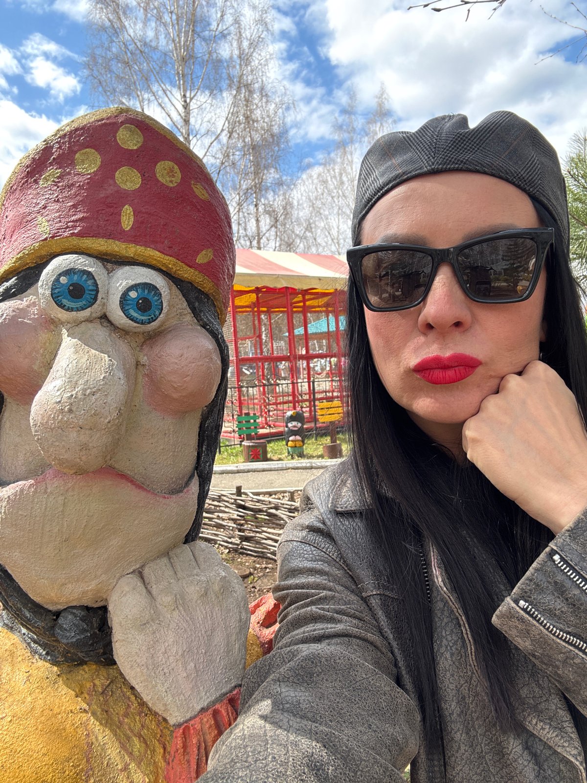 Mother and child enjoy morning at Chaikovsky amusement park