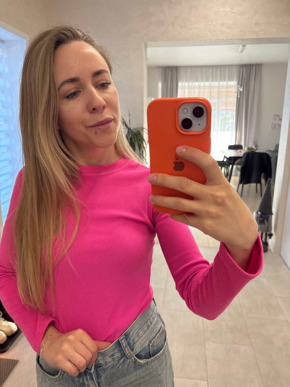 Woman takes multiple selfies in Chaikovsky, Russia apartment