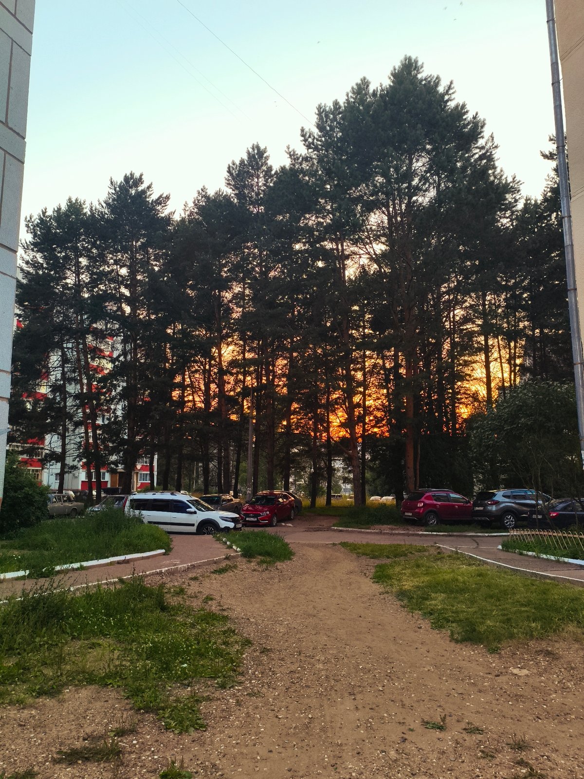Dusk stroll past gravel paths and an urban construction trench