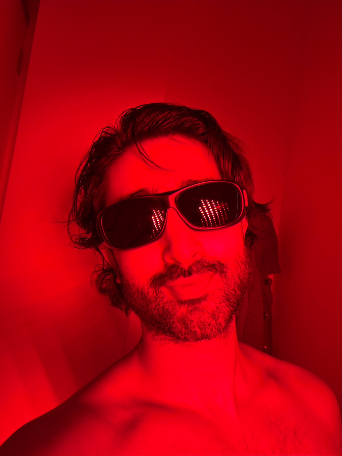 Man photographed with red LED light panel in London