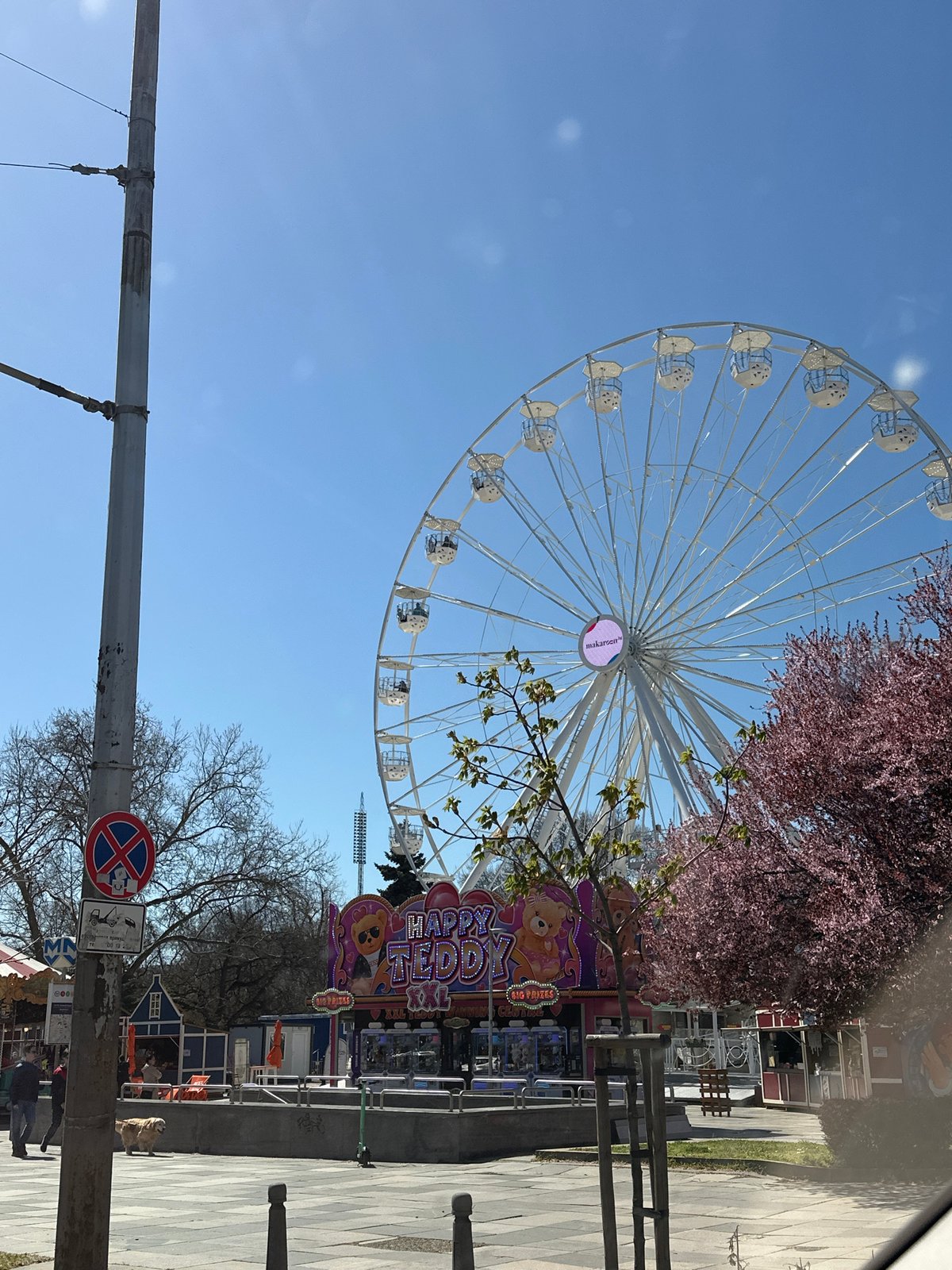 Morning scenes captured across Sofia including Ferris wheel and university