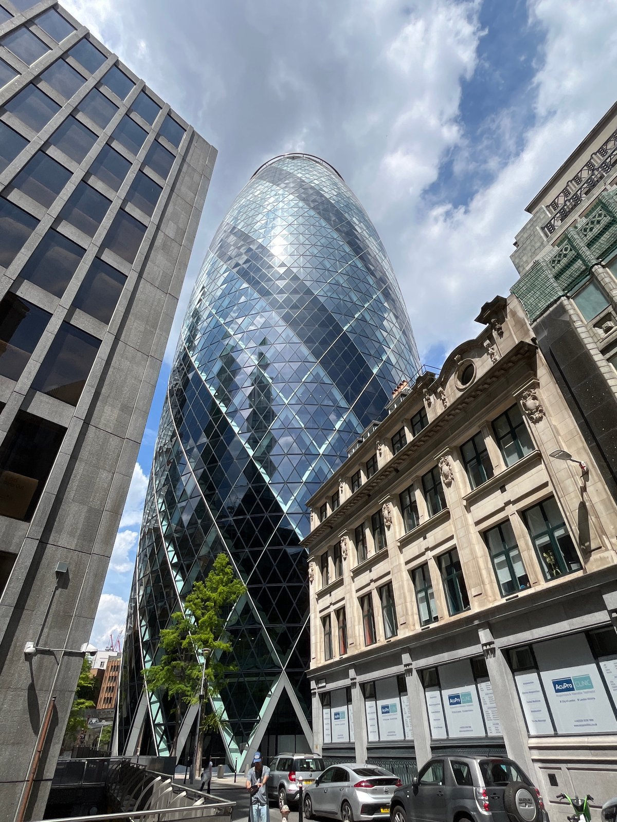 Street-level views of the Gherkin and City of London towers