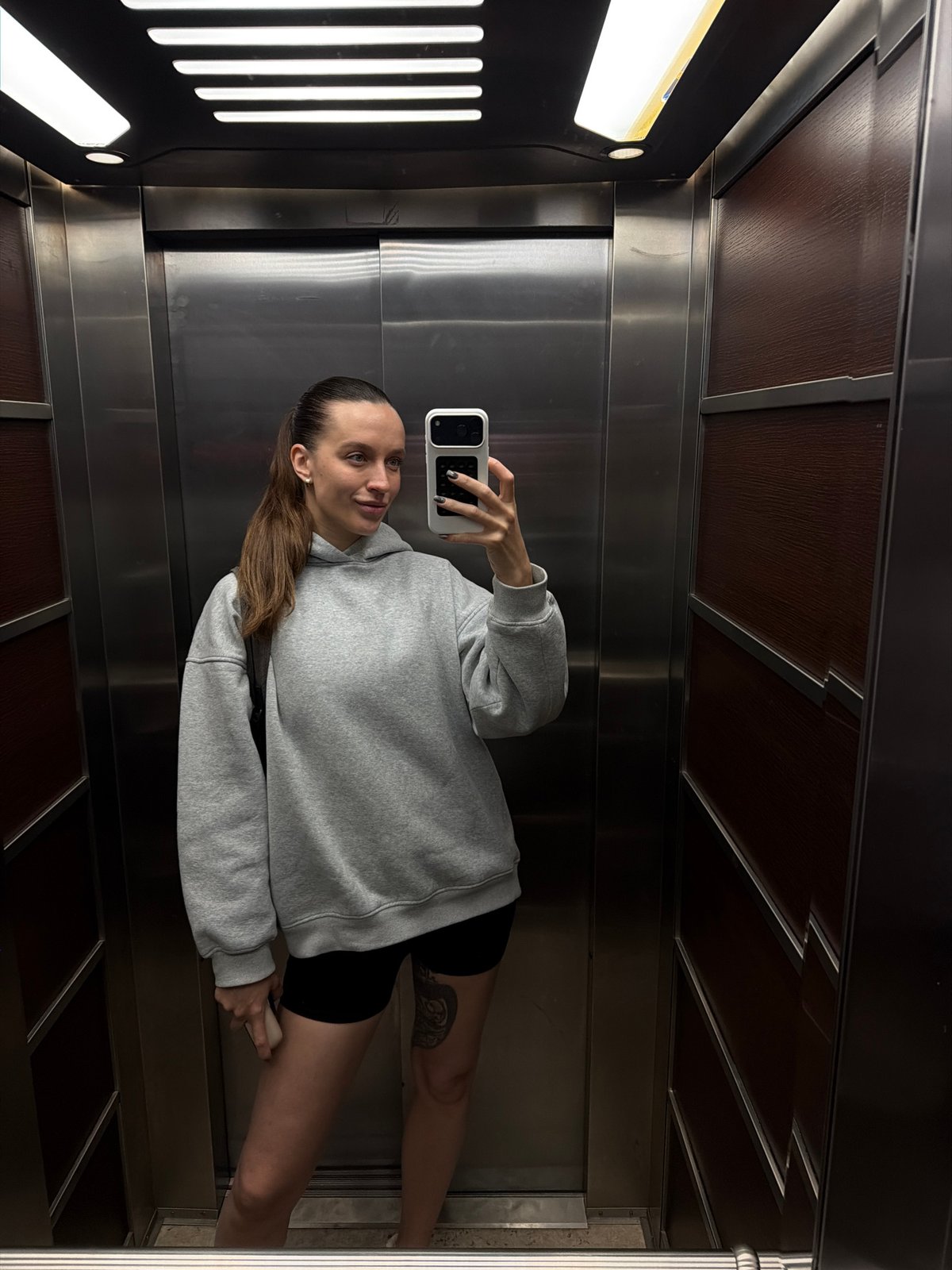 Woman takes elevator selfie in Budva, Montenegro