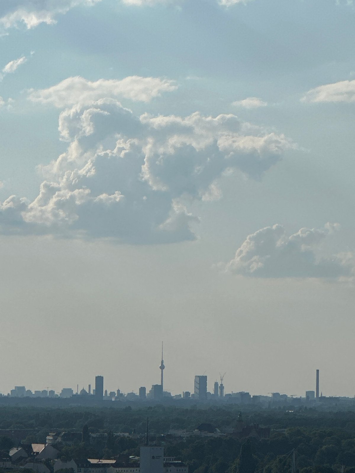Berlin skyline at golden hour, captured from multiple angles
