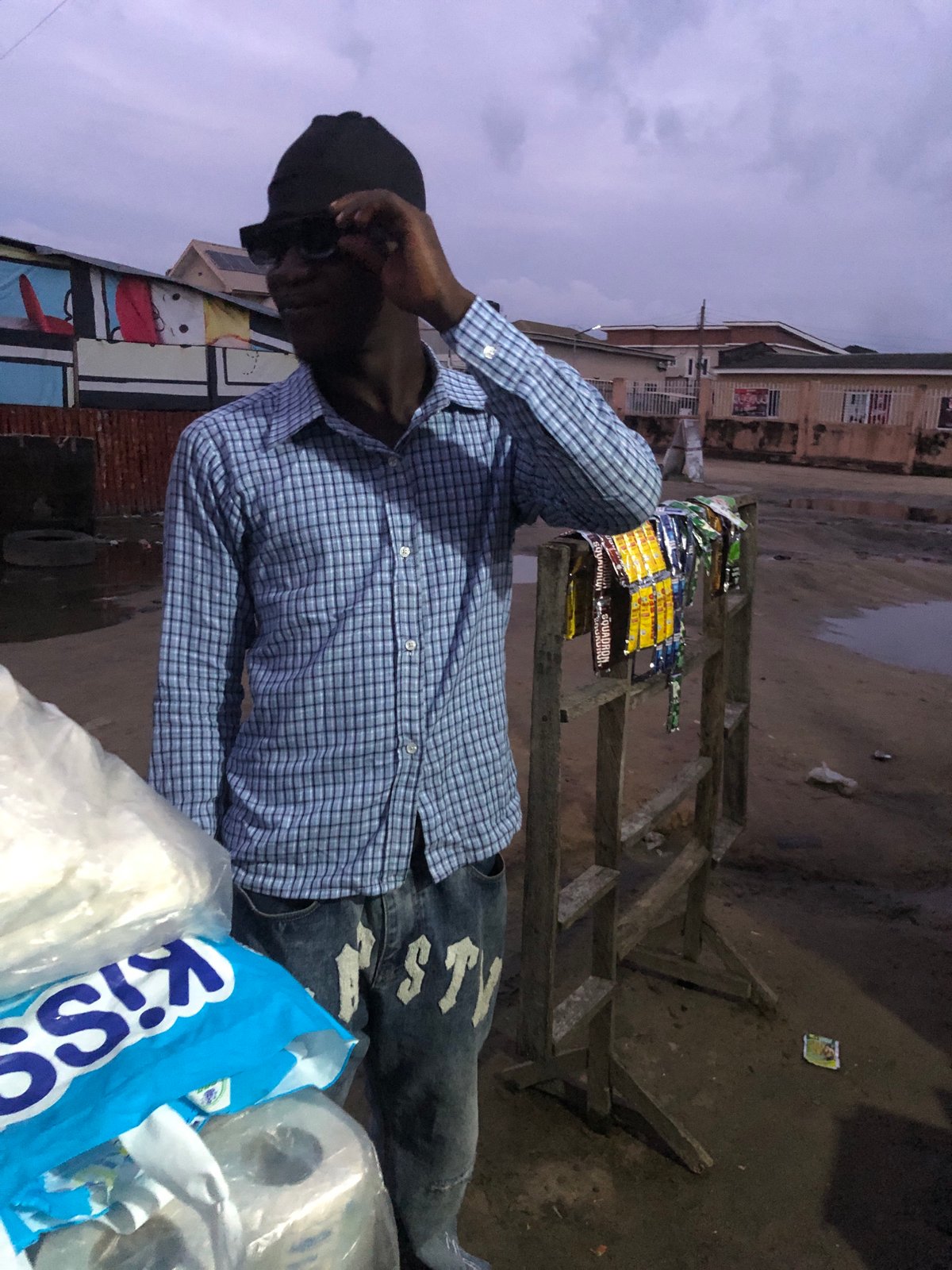 Evening street commerce and daily life in Ado, Nigeria