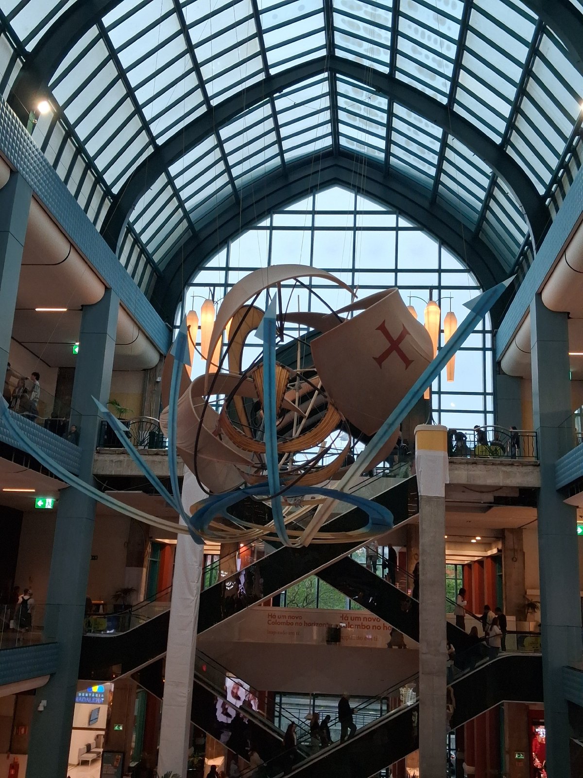 Shoppers observe maritime art installation at Lisbon mall