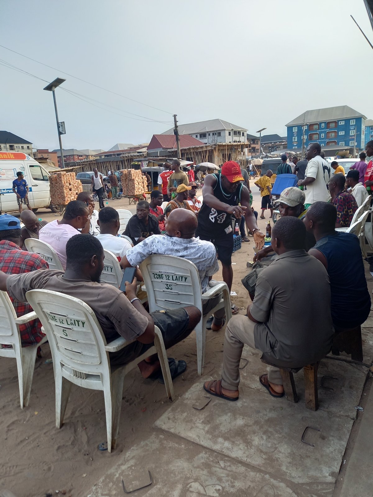 Daily life scenes documented across Onitsha markets and community