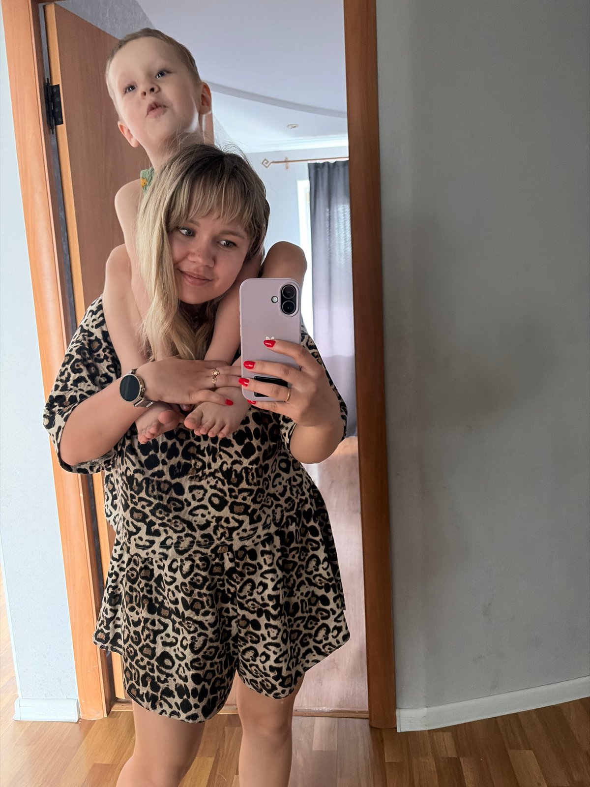 Mother and child share casual moments during morning in Chaikovsky