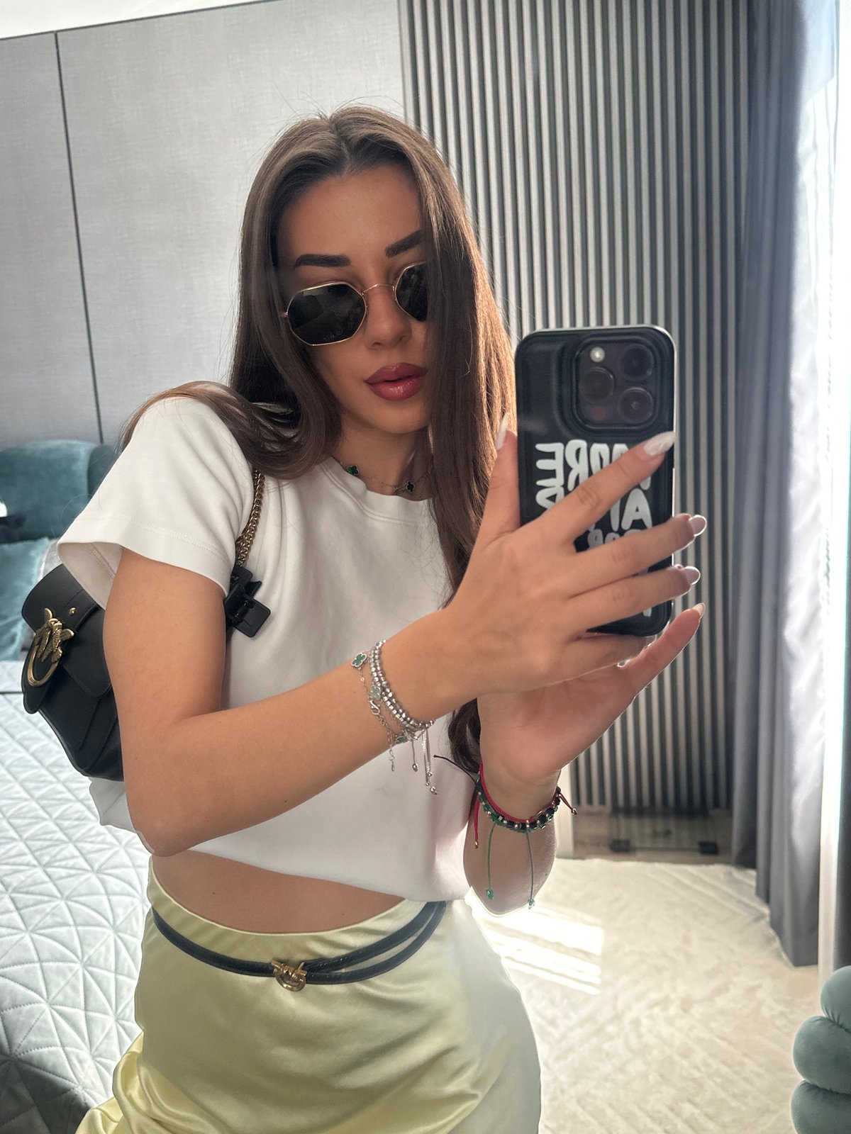 Mirror selfies in a Sofia apartment, casual outfit check