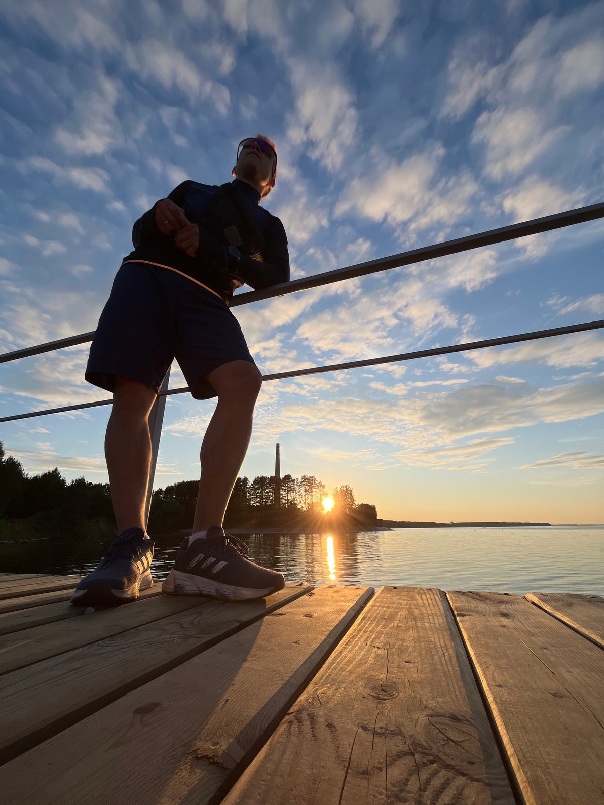 Sunset pier activities captured in Chaikovsky, Russia
