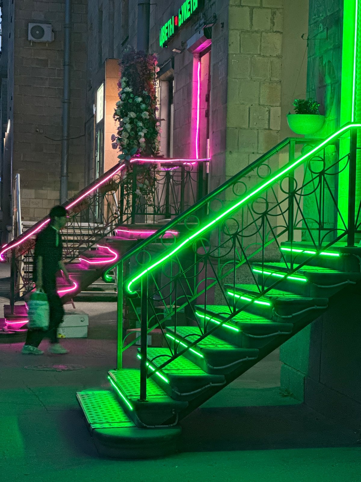 Nighttime urban walk documented across illuminated Saint Petersburg