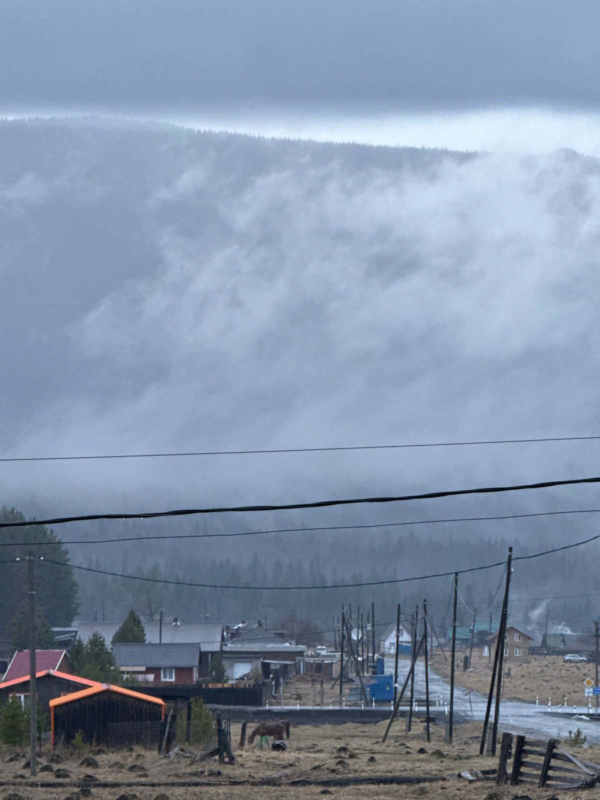 Spring rain creates muddy conditions in rural Russian communities