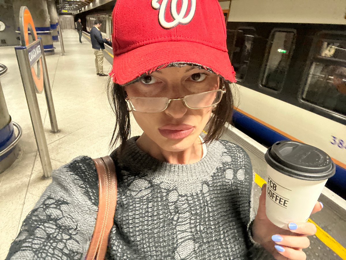 Commuter takes selfie at Camden Town Underground station