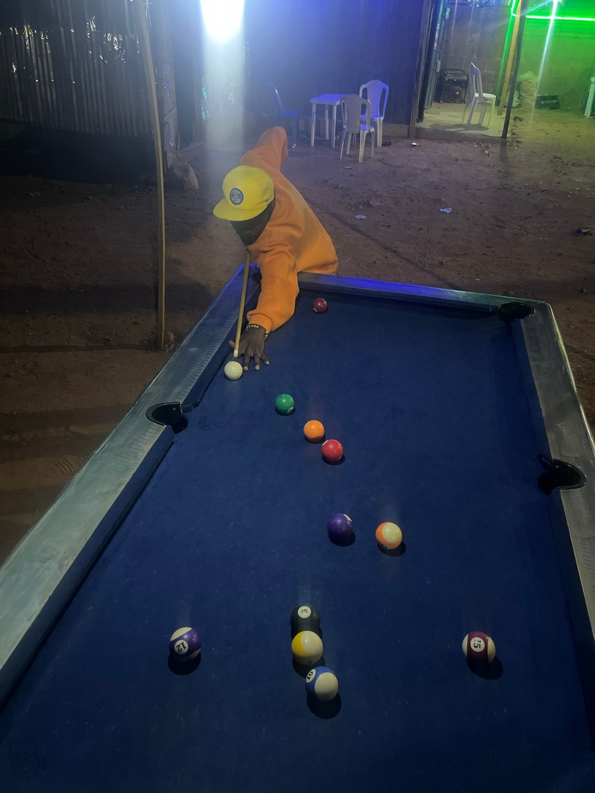 Nighttime billiards game observed in Gura Top, Nigeria